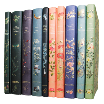 A set of eight vintage hardcover book spines lined up side by side on a white background. The books feature colorful floral and bird illustrations with gold lettering and are identified as Jane Austen's 'Pride and Prejudice', 'Sense and Sensibility', 'Emma', 'Mansfield Park', 'Northanger Hall', 'Persuasion', 'Lady Susan', and 'Victoria'.